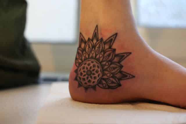 Wildflowers tattoo on the inner ankle  Tattoogridnet