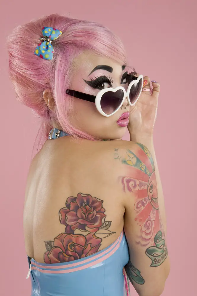 rose back tattoos on asian women