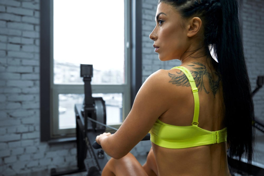 upper back tattoo on fitness women