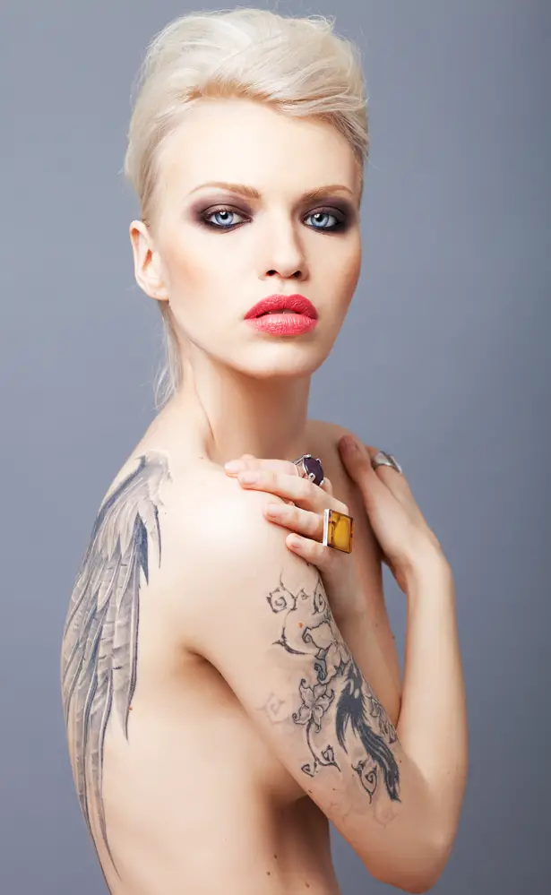 stunning back tattoos on blonde model