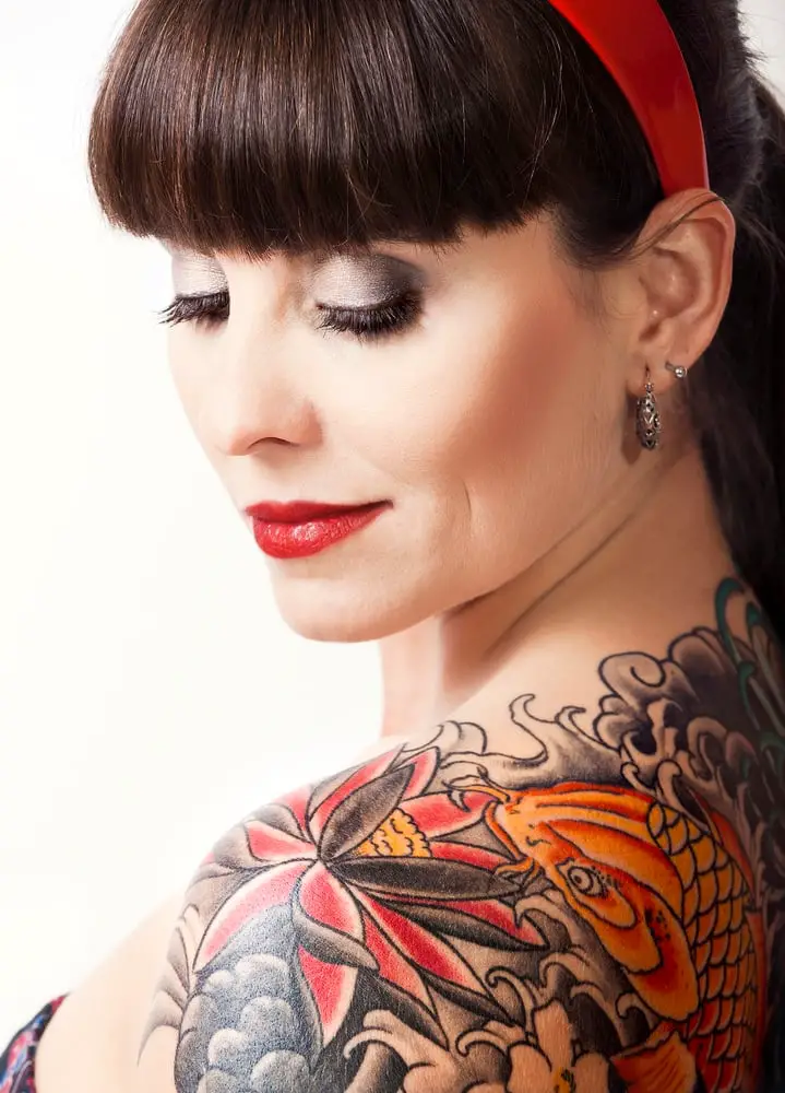 stunning back tattoos of bright colors on women