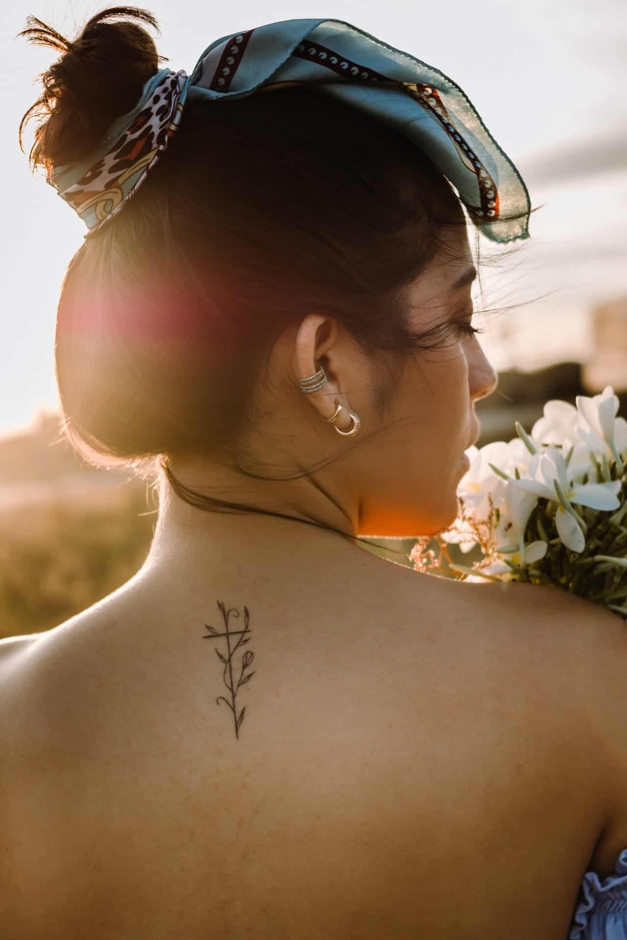 upper back small tattoos on women