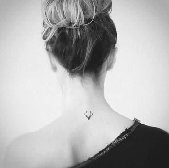 16 Pretty Back of the Neck Tattoos That Have Us Obsessed PHOTOS   CafeMomcom