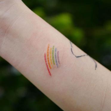 23 Rainbow Tattoo Design Examples for Pride Month and Beyond