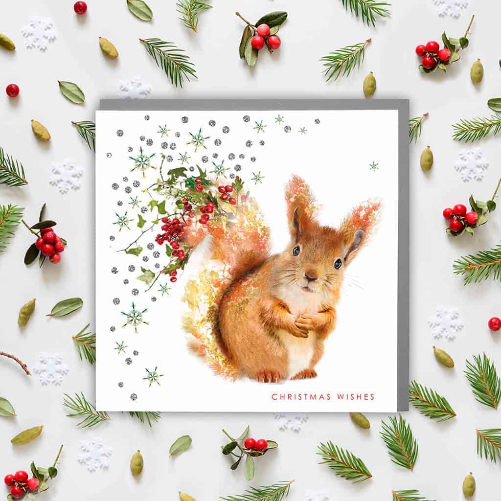 a christmas card with a cute squirrel