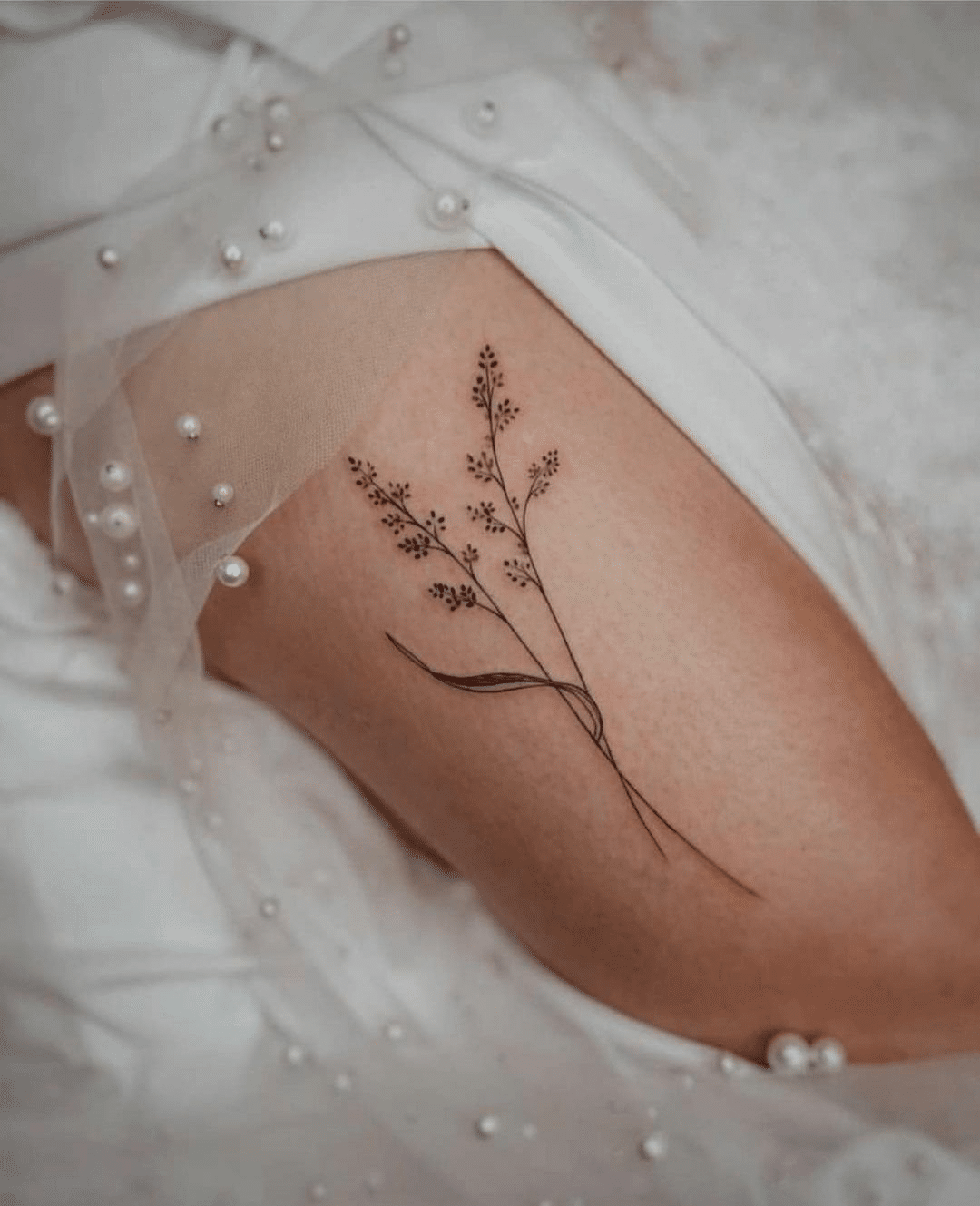 detailed ornamental leg tattoo design for women