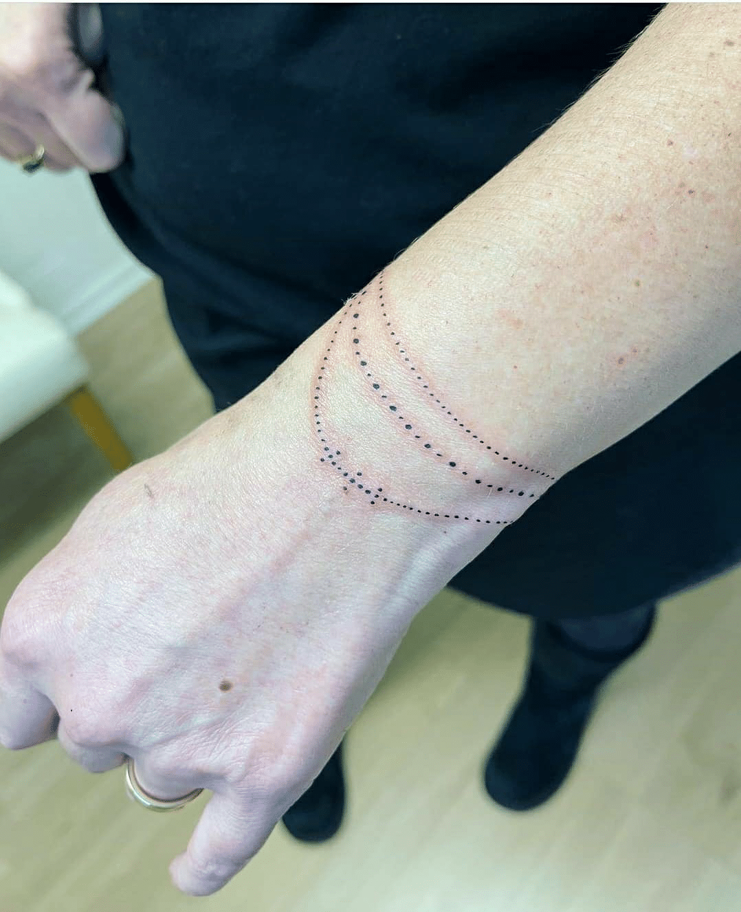 dotwork bracelet arm tattoo for girls