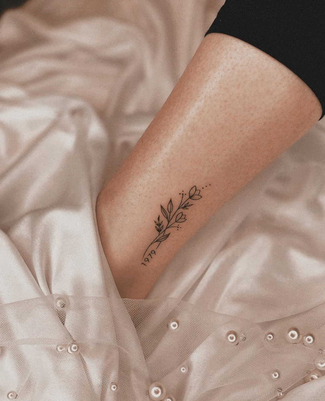 fine line floral leg tattoo for women