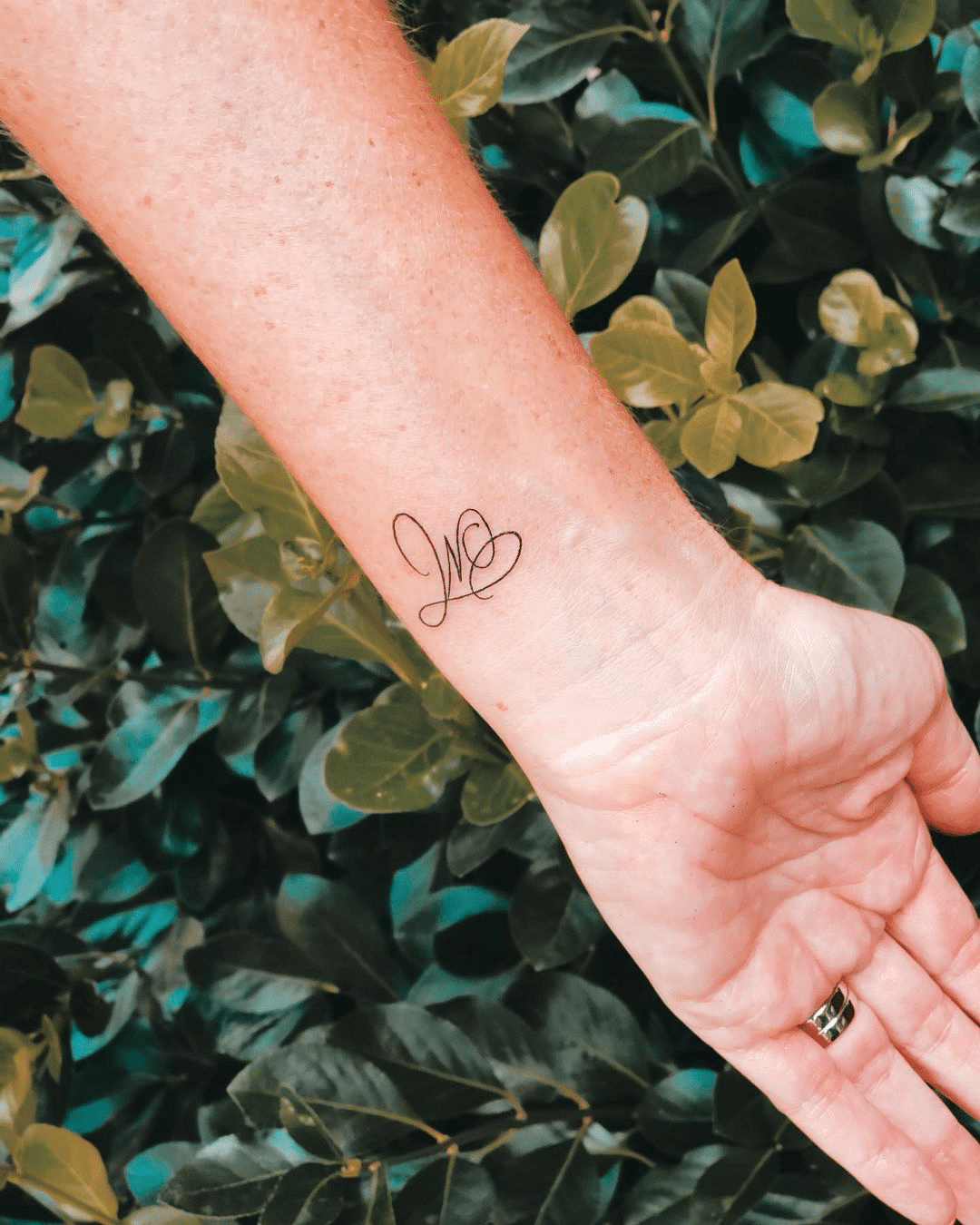 letter small tattoo design idea for women