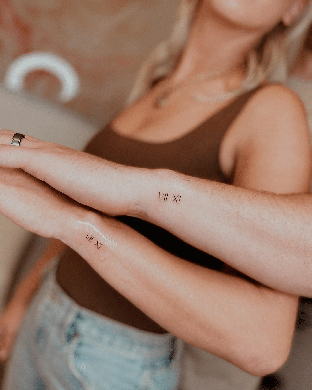 roman number tiny tattoo idea for couples