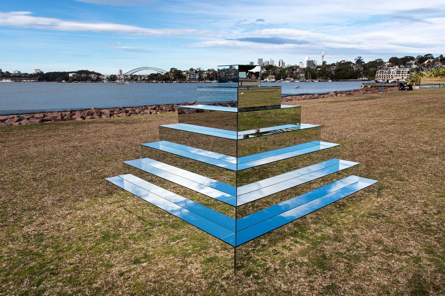 mirror installation outdoors that creates geometric illusion
