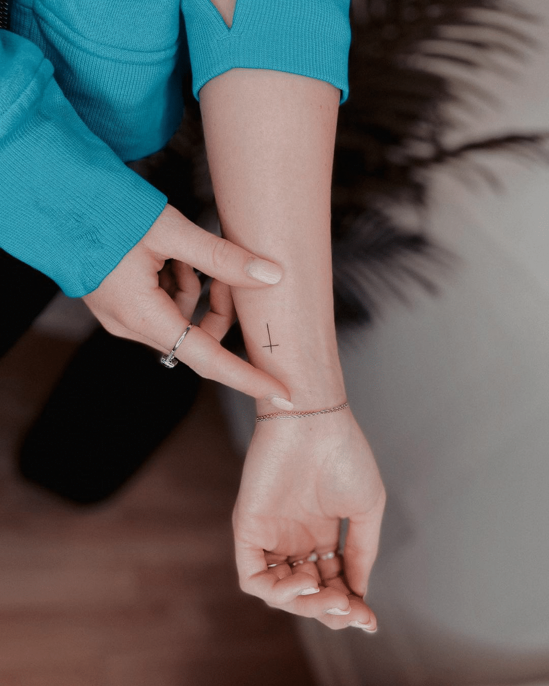 simple cross religious tattoo design for women