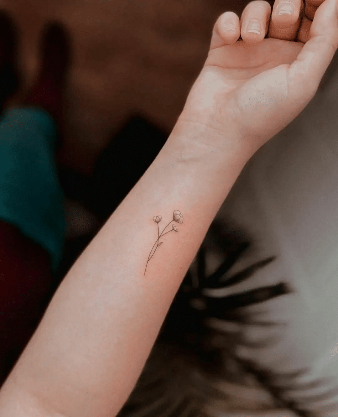 simple flower line tattoo ideas for girls