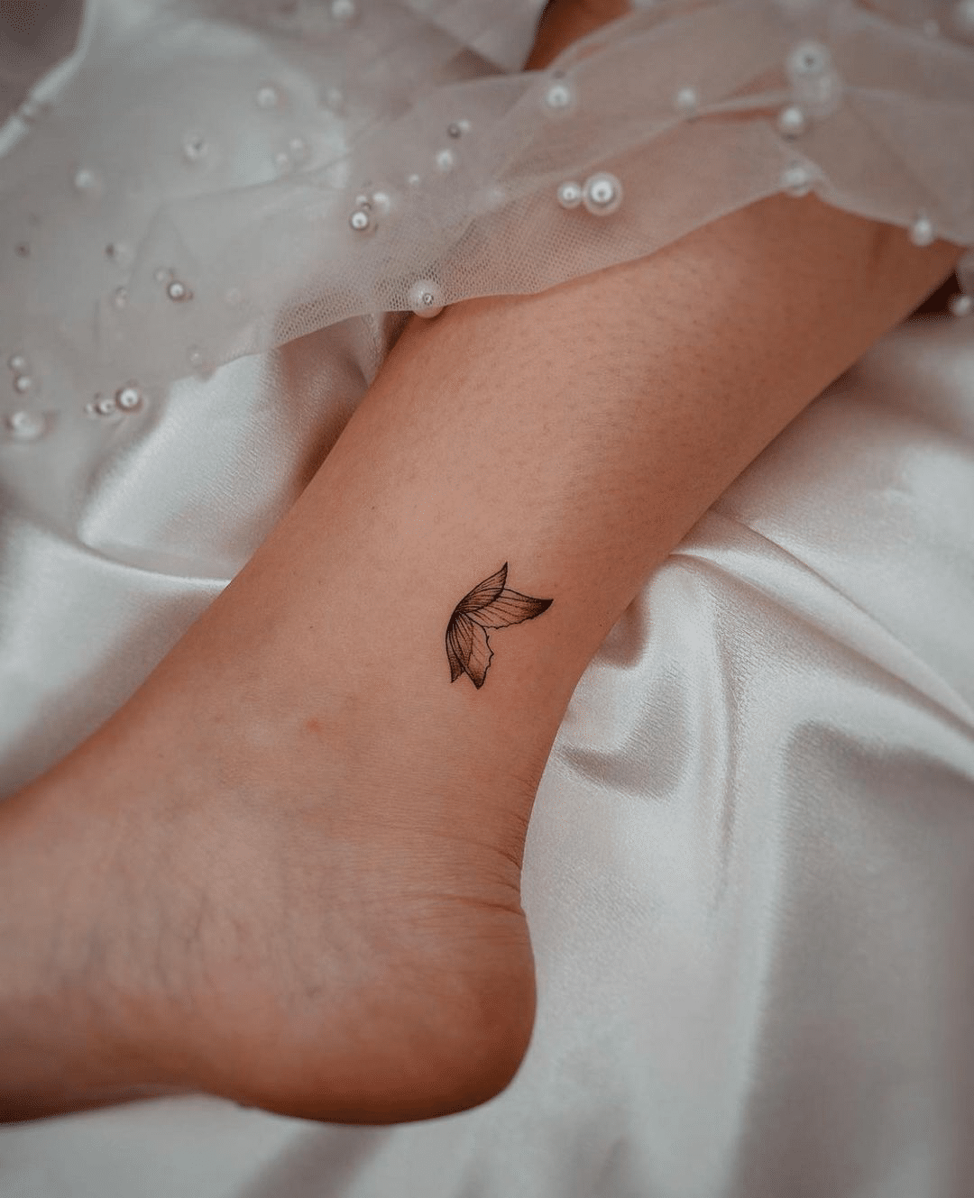 small butterfly fine line tattoo for girls