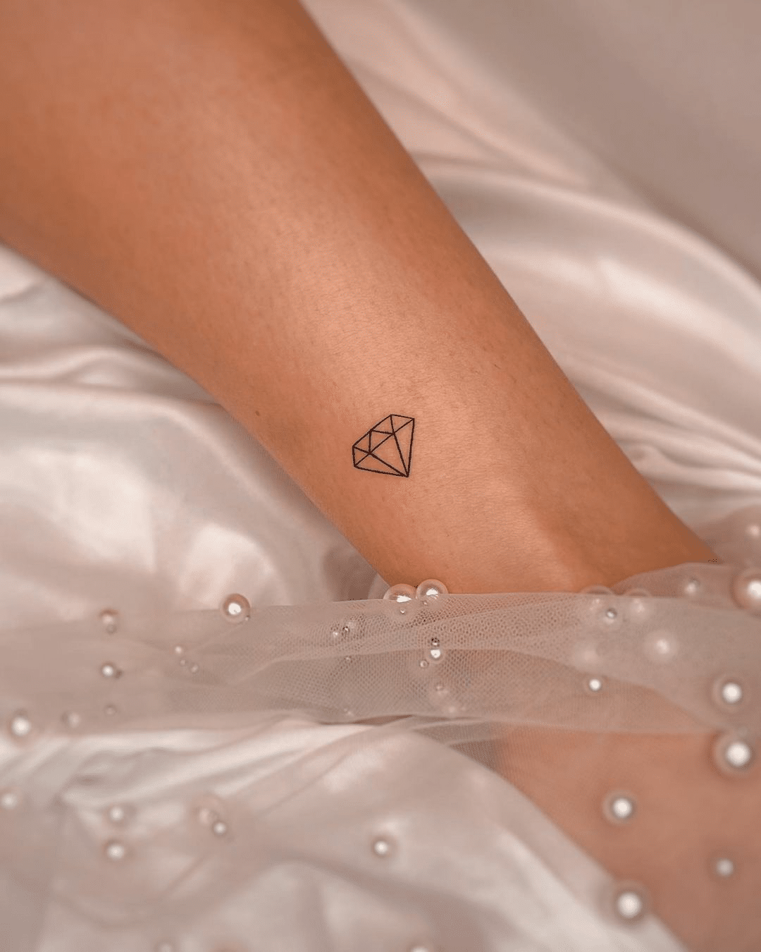 small diamond tattoo design for women