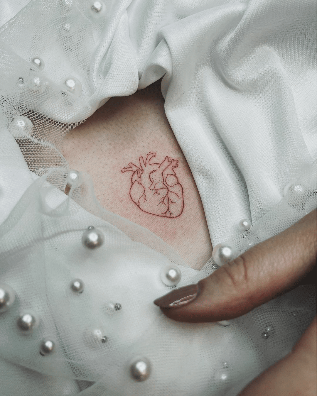 small heart tattoo design for women