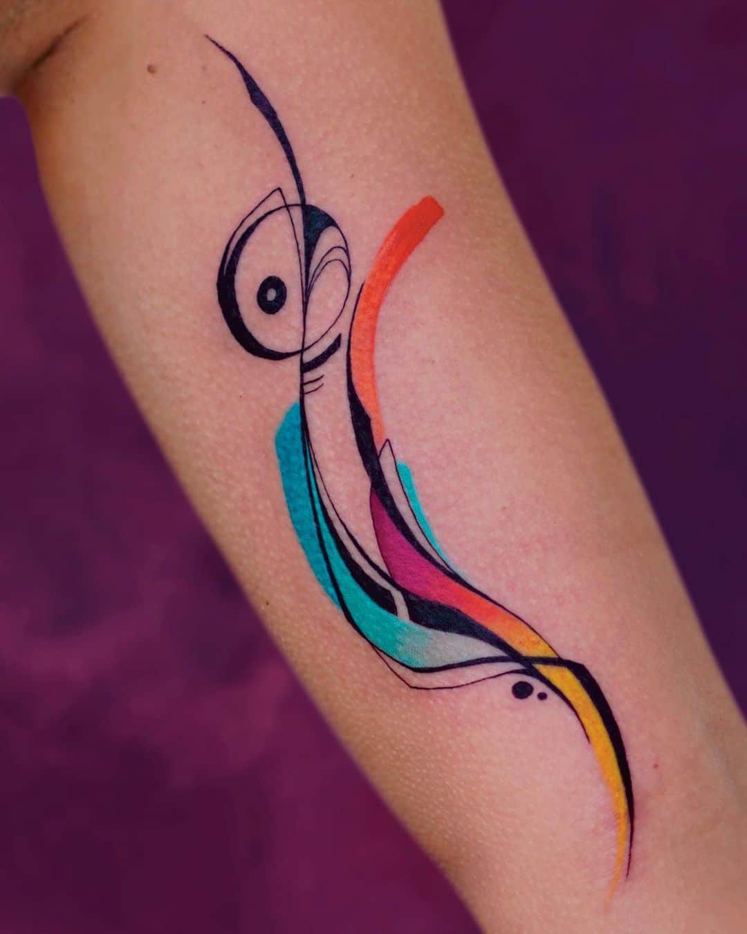 feminine abstract colorful tattoo