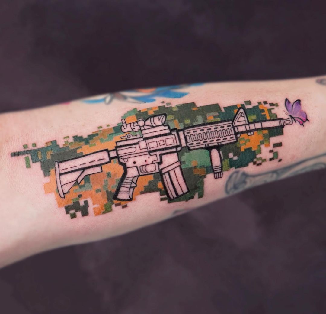 colorful gun tattoo design