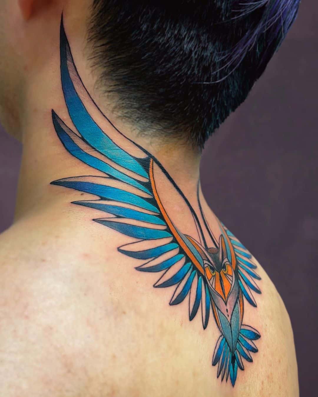 owl colorful tattoo on the neck