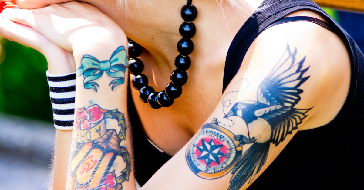 woman with tattoos on arms