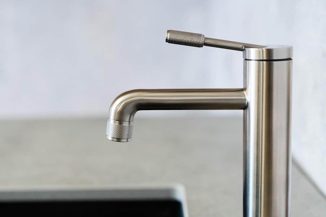 chrome finished kitchen faucet with beautiful refined details