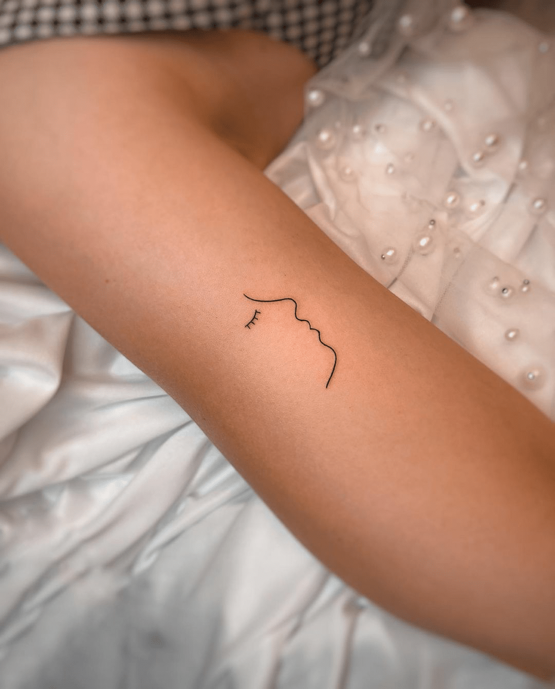 small line art tiny tattoo design for girls 