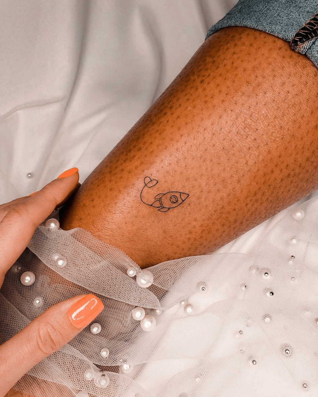 small rocket tattoo design for girls
