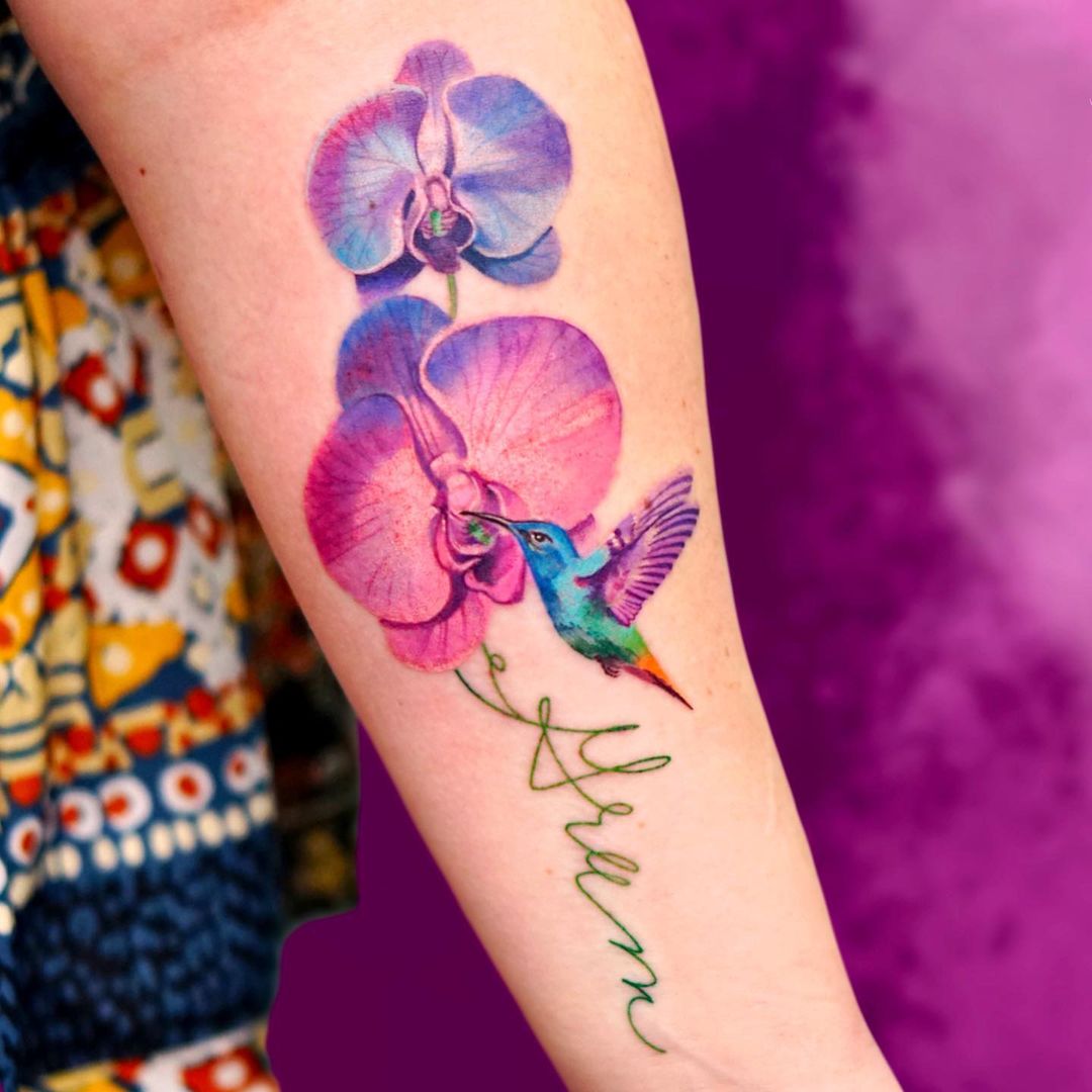 Orchids And A Humming Bird Colorful Tattoo